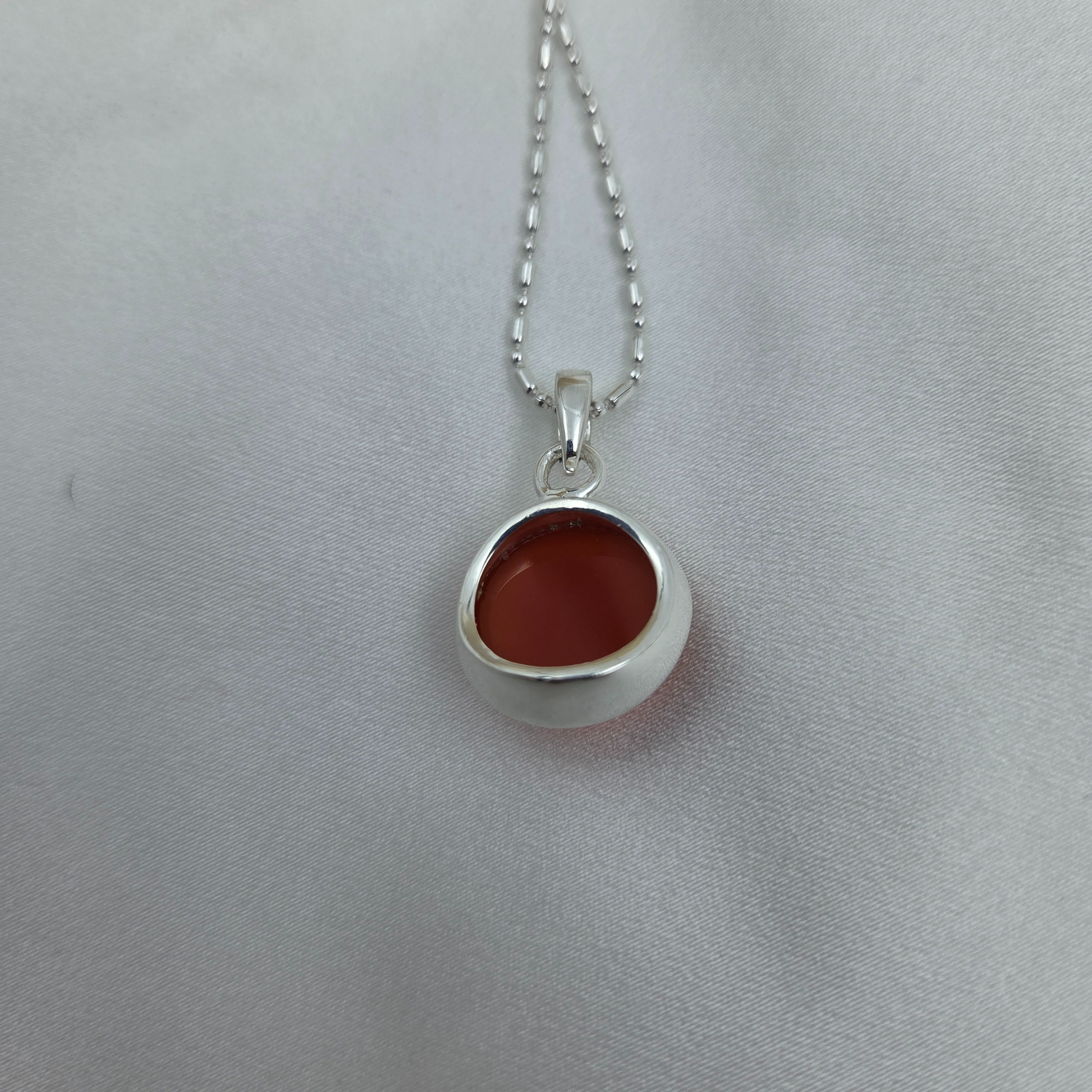Carnelian and silver Pendents