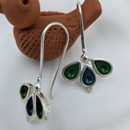 Three leaves with peacock colours